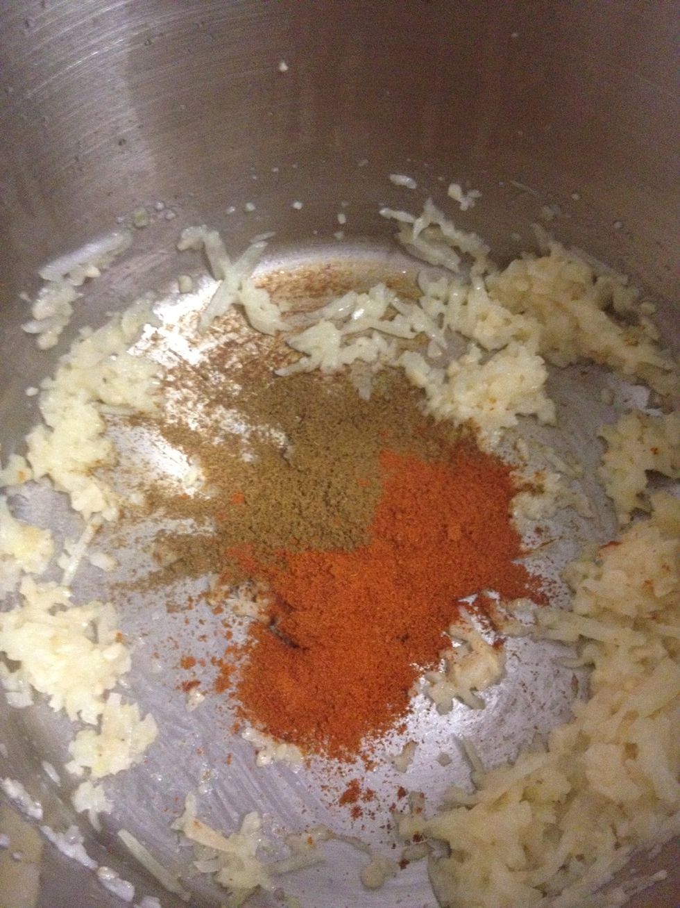 Add cumin, ground coriander and cayenne pepper and cook, stirring for 1 minute.