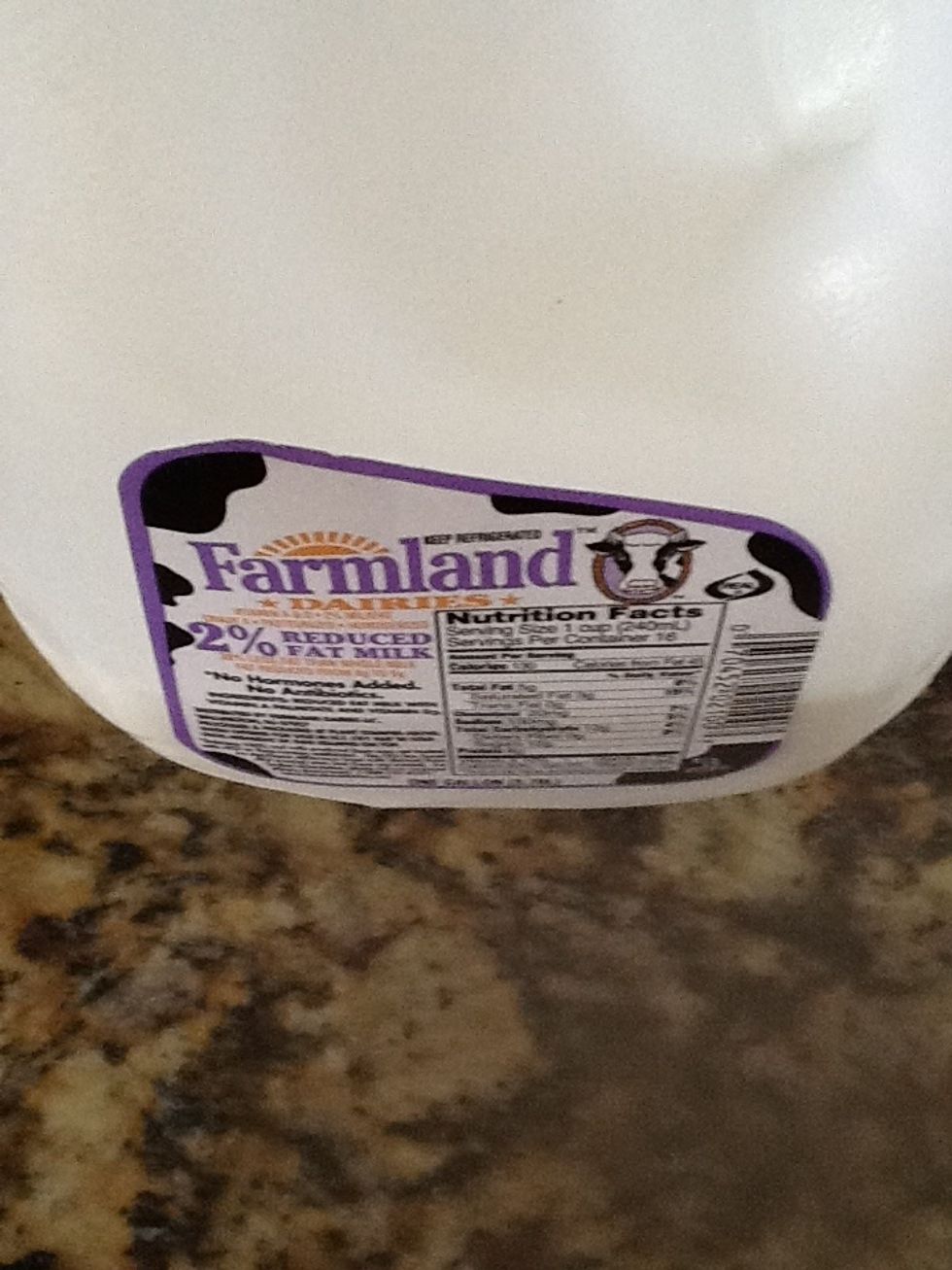 Add cup of milk to eggs and whisk