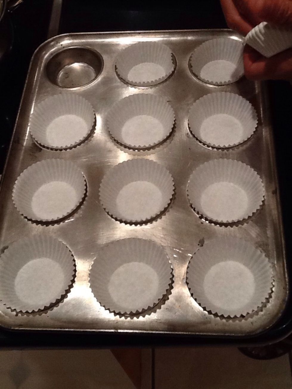 Add cups to your cupcake tray.