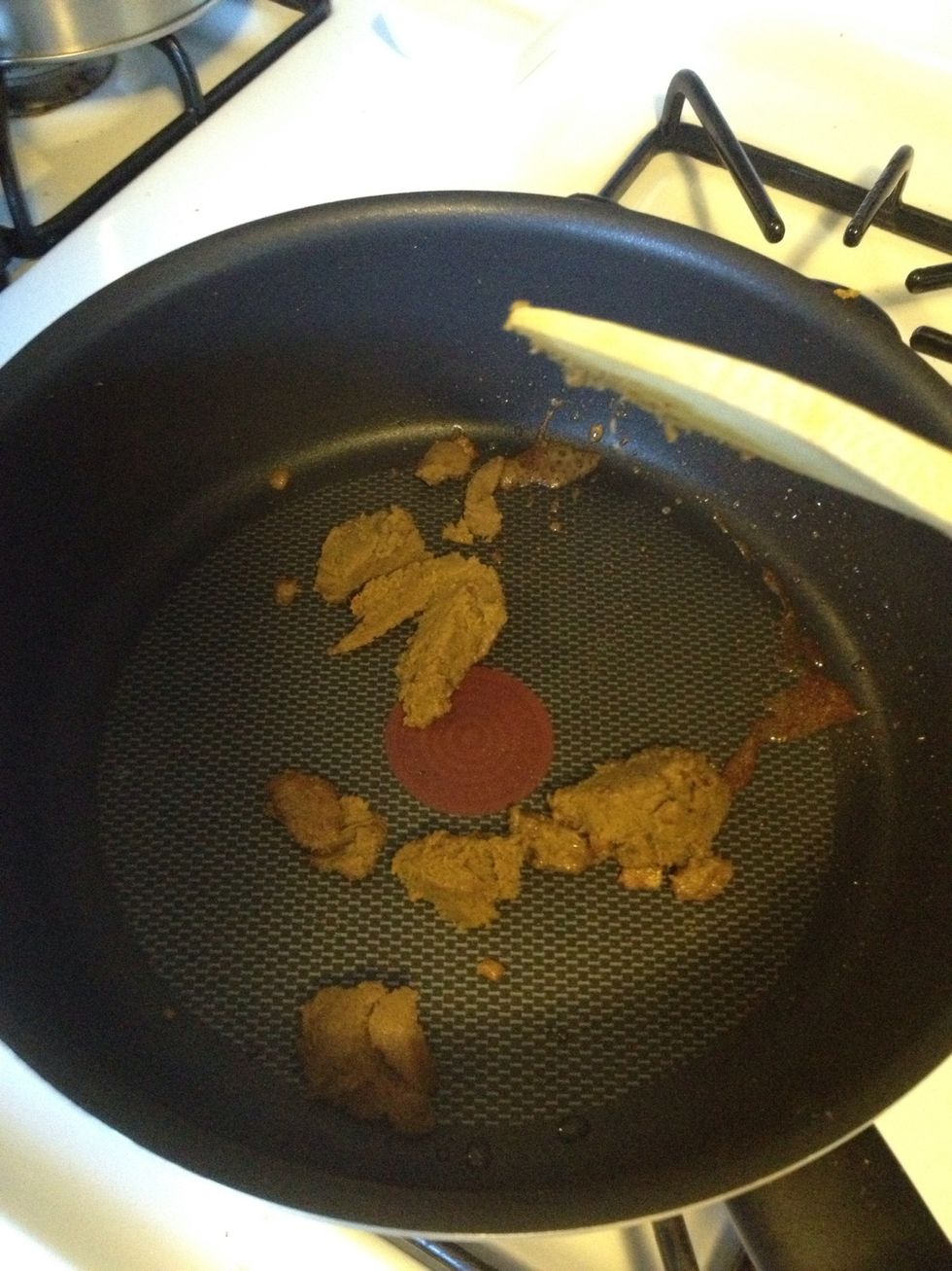 Add curry paste, then chilies and red onion. Then lemongrass