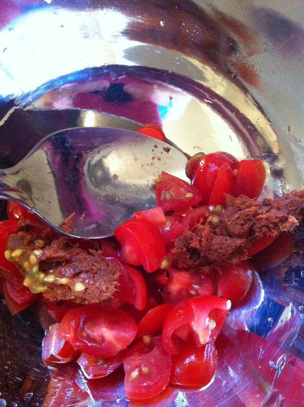 Add curry paste to grape tomatoes and then pound them with red curry until mix well. ( I just mixed them together with spoon)