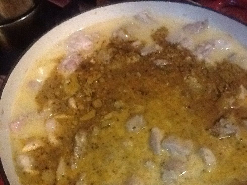 Add curry powder and simmer over low hest until chicken is cooked through.