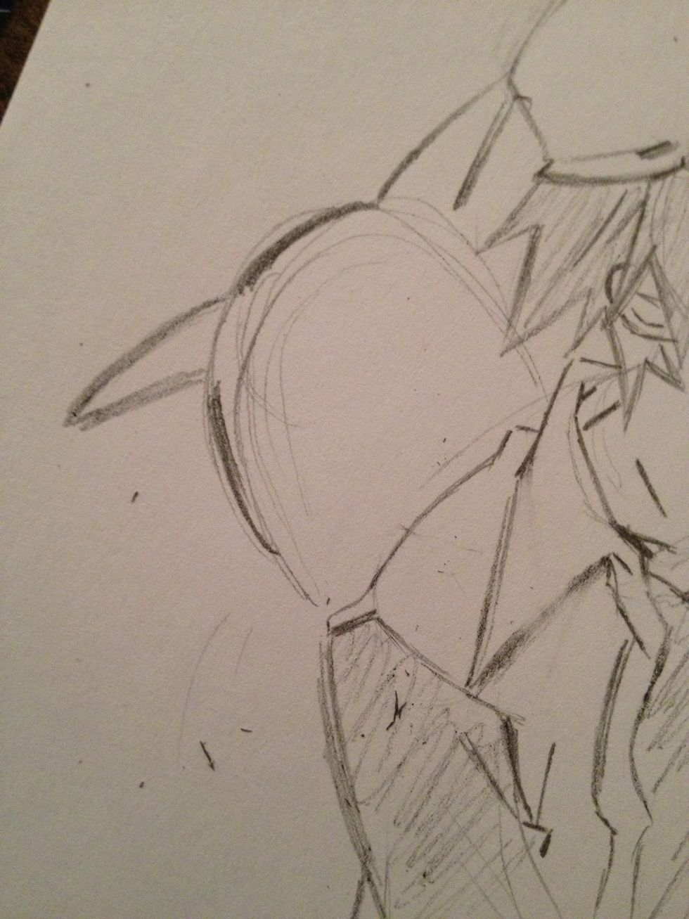 Add curved triangles for his ears