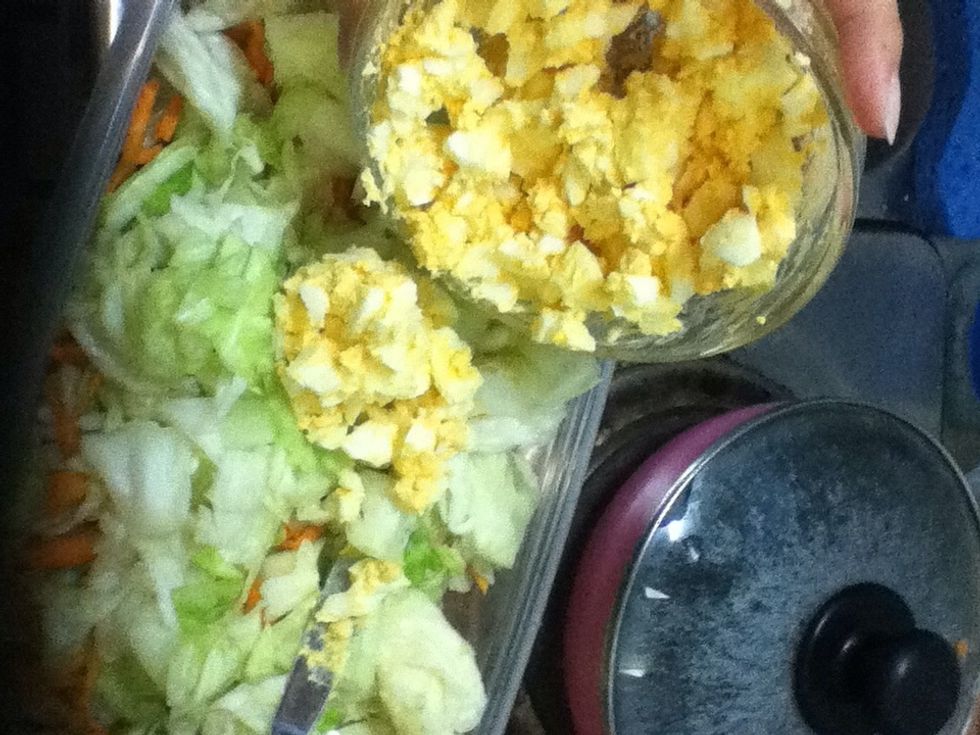 Add cut boiled eggs.