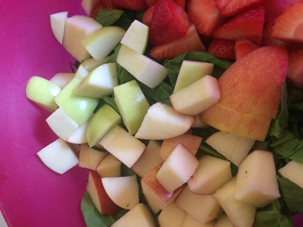 Add cut up green and red apples
