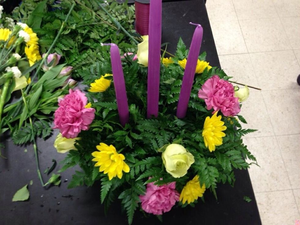 Add daisys high and low between carnations and roses