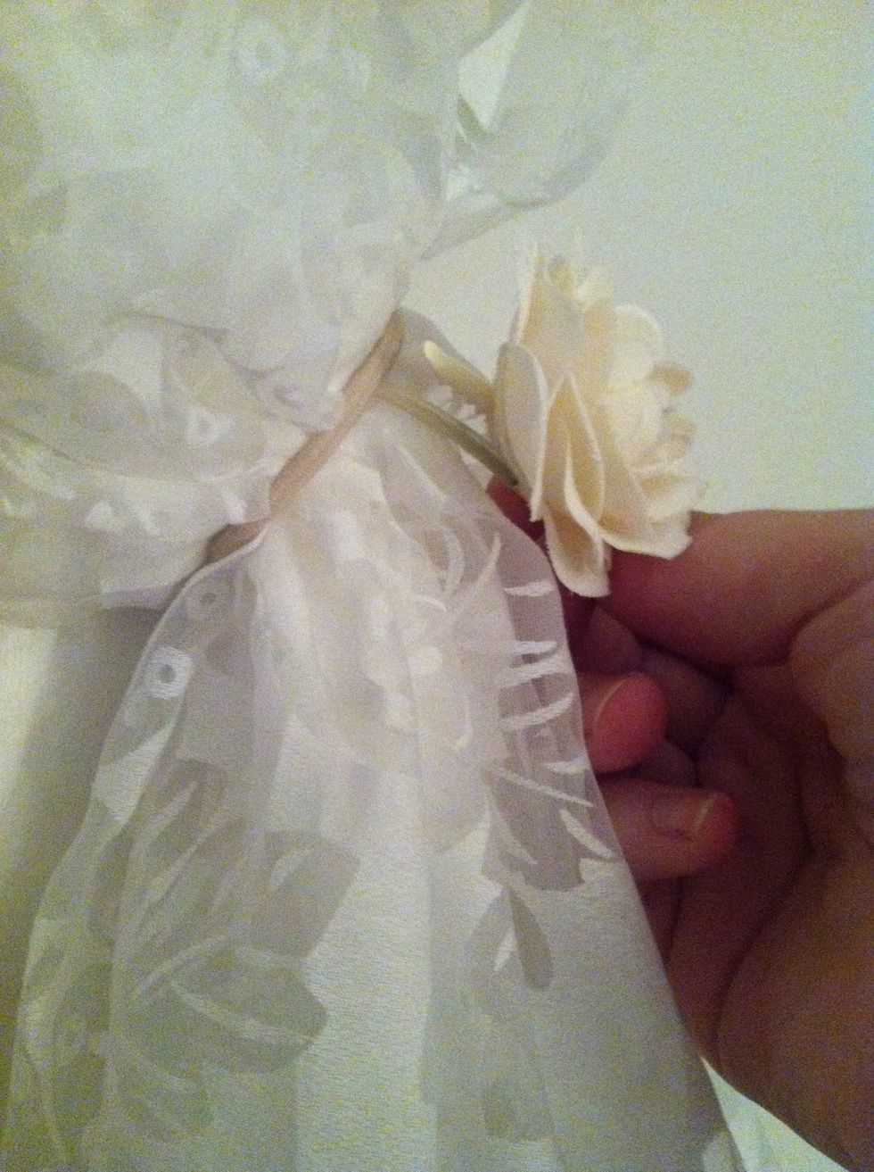 Add decoration ( I'm using a rose hair pin I bought at forever 21 for $3.00) you can choose whatever decoration you like