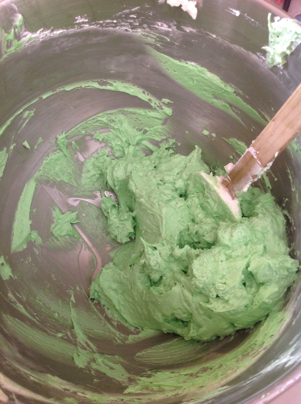 Add desired amount of green to buttercream and mix well