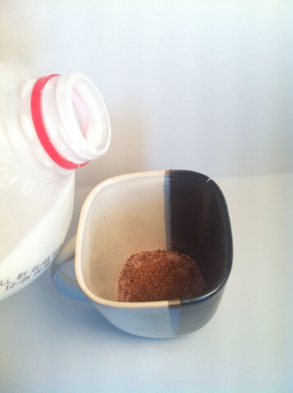 Add desired amount of milk. I suggest leaving enough space in the cup for whipped cream :) i added a bit to much milk to my example, and it overflowed a bit.