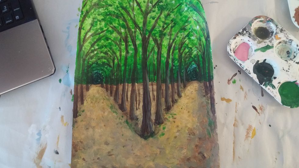 Add details like highlings and shads to the trunks of the trees. Also bring more leave colors and dab some at the end of branches to make it look like they are attached to the branches.