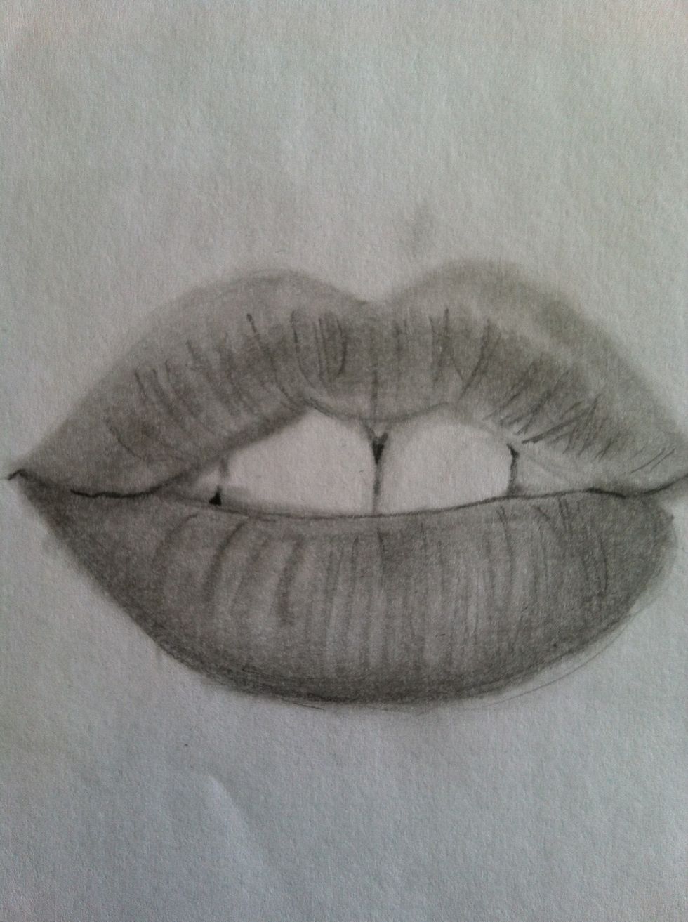 Add details such as the lines that you see on the lips