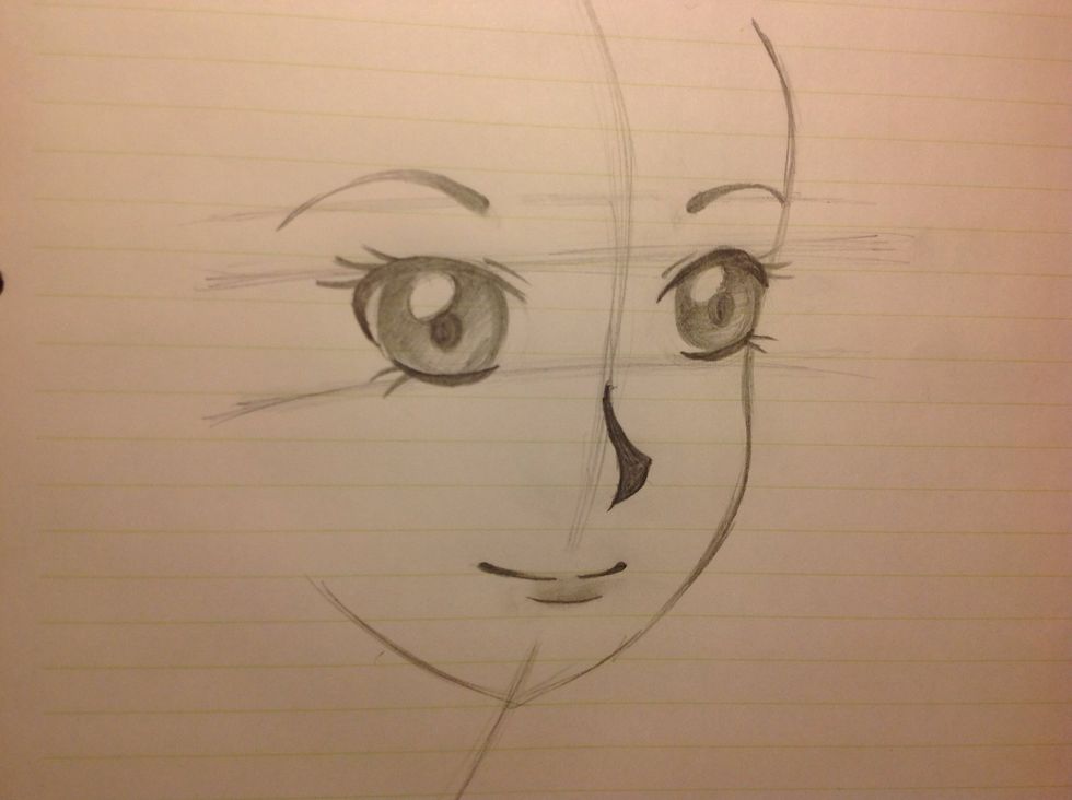 Add details to your eyes. Add the lashes, eyebrows, and finish the rest of the face.