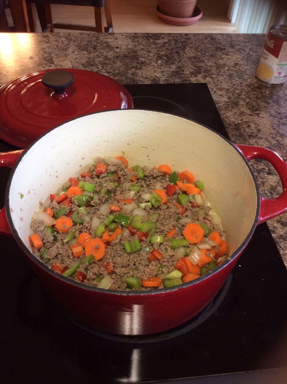 Add diced carrots and peppers.