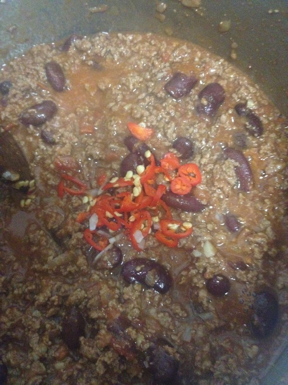 Add diced chilli and turn the stove to low an simmer. Simmer for 20minutes or 3 hours. The longer you cook the better it will taste.