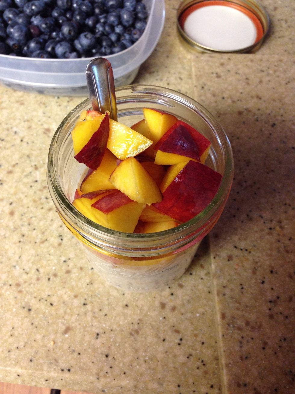Add diced peach to mason jar.