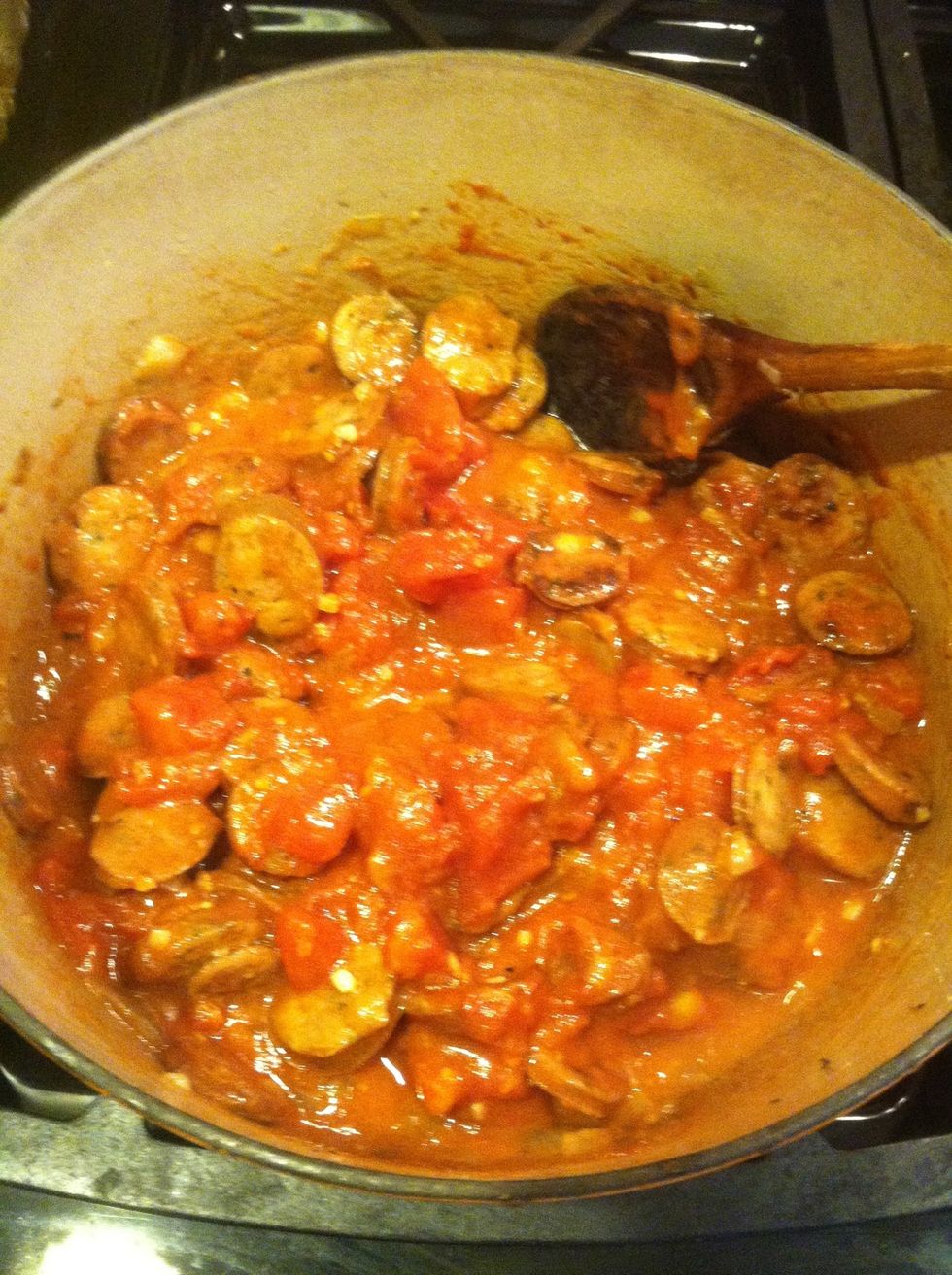 Add diced tomatoes and paste