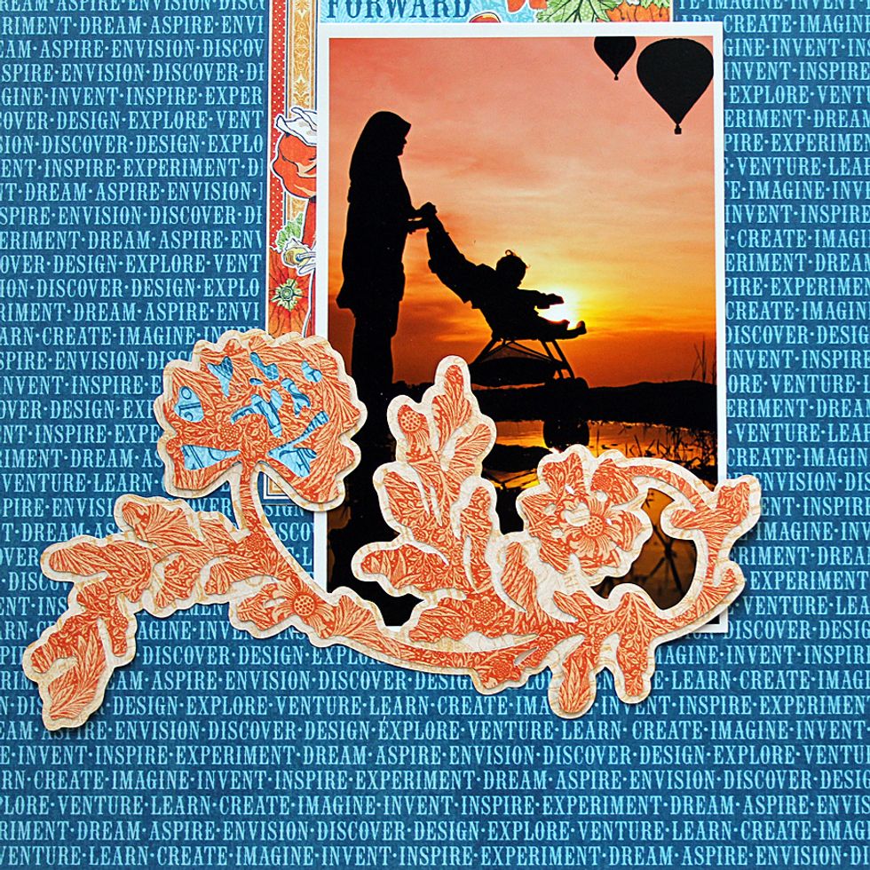 Add die cut to the bottom of the photo.