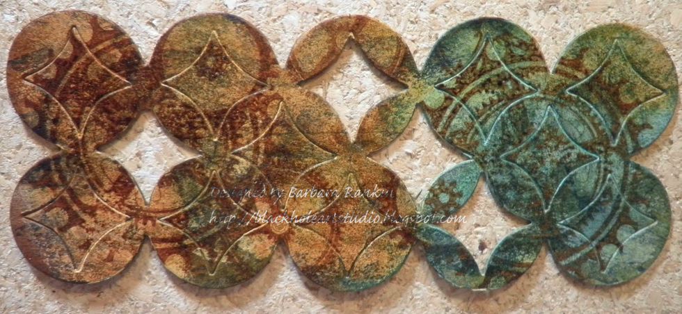 Add Distress ink colors over die cut. Pop out a few of the centers.