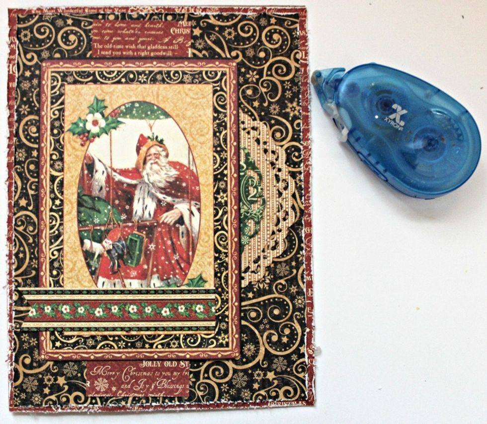 Add distress pattern paper to top of card stock along with die cut Majestic Circles. Adhere St Nicholas Ephemera Card to top of card,