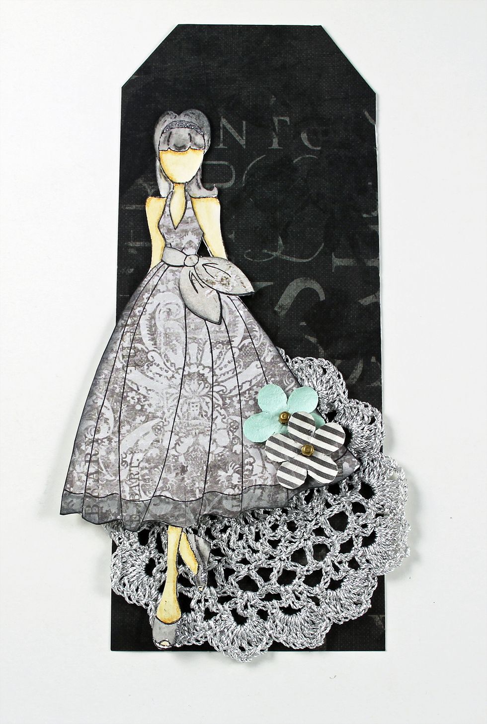 Add doll to the left side of the tag.