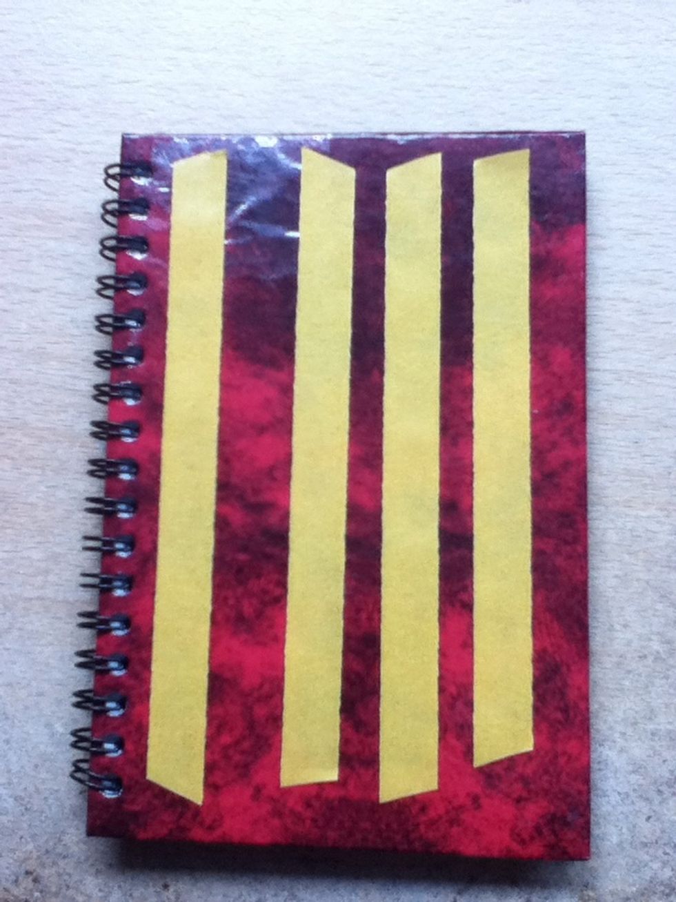 Add double sided sticky tape to the front. Repeat on the other side.