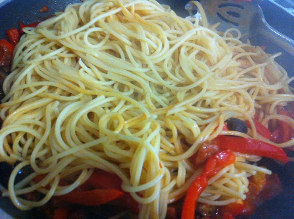 Add drained pasta to sauce on low heat and toss (add olive oil as necessary) until everything is well incorporated