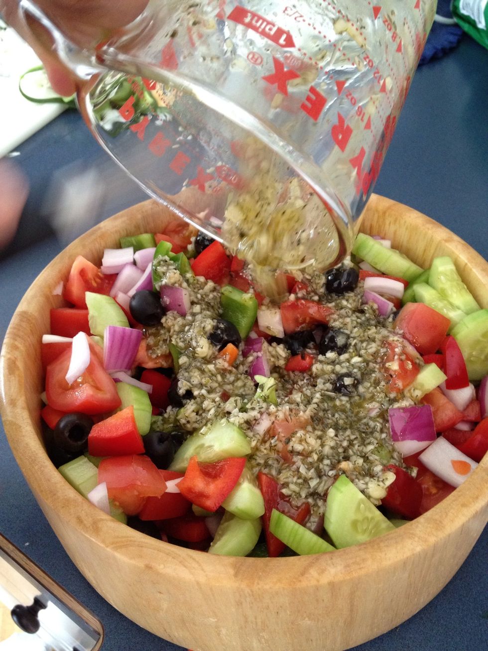 Add dressing to salad. Add feta just before you eat.