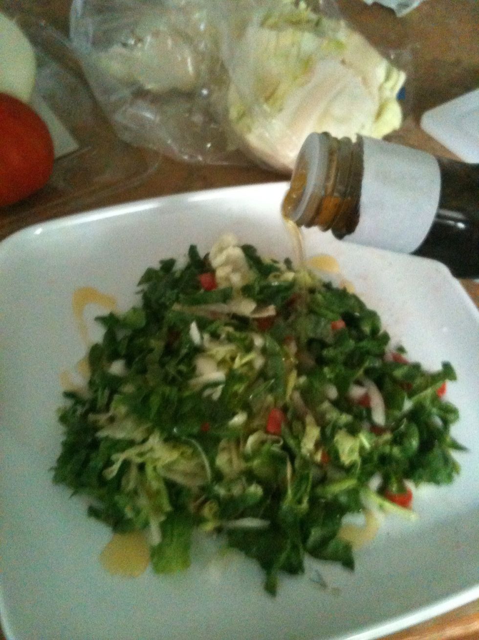 Add dressings and lime now. I used one lime, pepper, salt, and here balsamic vinegar.