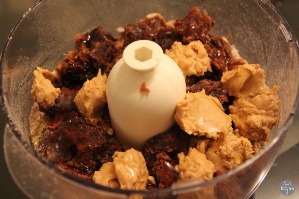 Add dried dates, peanut butter, agave nectar and milk then blitz again until all blended