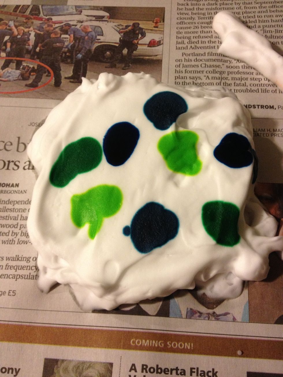 Add drops of food coloring, and remember less is more in this case! :D