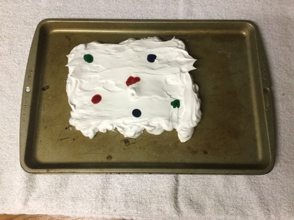 Add drops of food coloring.