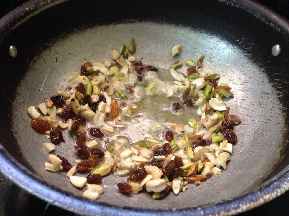 Add dry fruits mixture, you should put in high flame it should be fried in medium flame for just 2 min otherwise the dry fruits will become dark and tasteless...