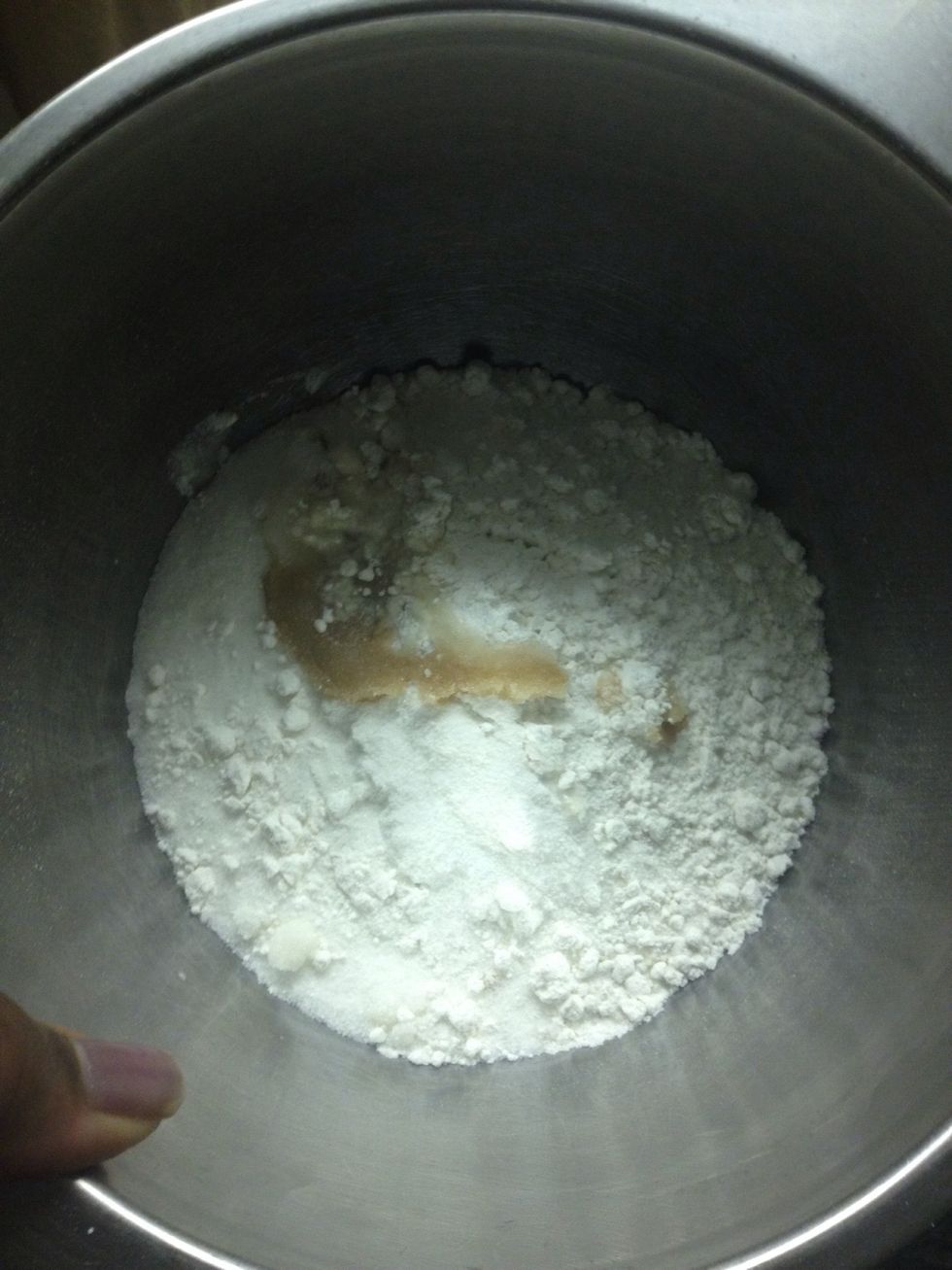 Add dry ingredients EXCEPT the cinnamon and powdered sugar. Add the extract to the bowl also. Preheat oven 300. Now place the powdered sugar onto a plate and sit aside.