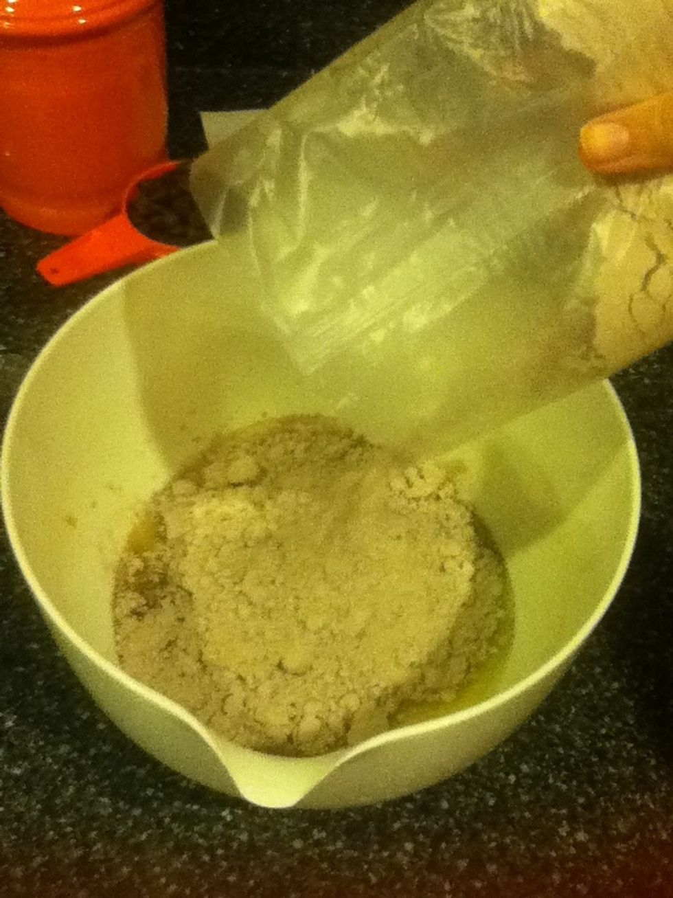 Add dry ingredients into the wet and stir