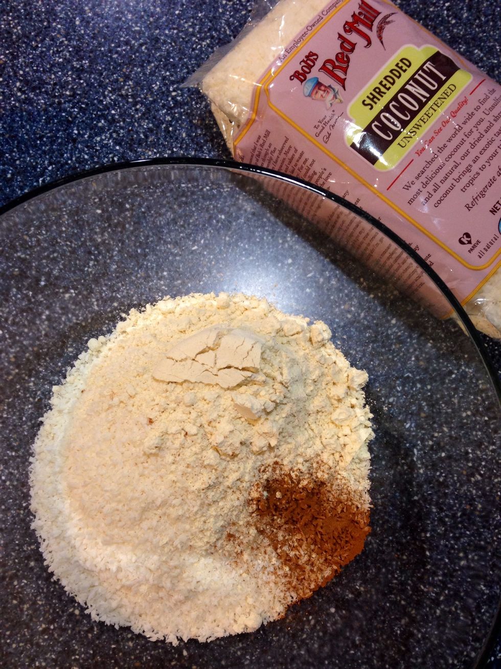 Add dry ingredients(shredded coconut, all-purpose flour and a pinch of salt) to a bowl.