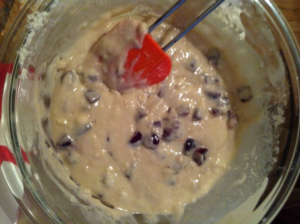 Add dry ingredients to the wet ingredients and mix until just incorporated. Carefully fold the cherries in being careful to not over mix.
