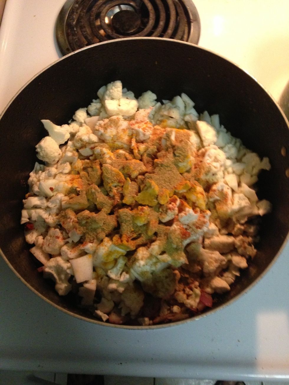 Add dry spices after adding gobhi so that the spices are not burnt in warm oil