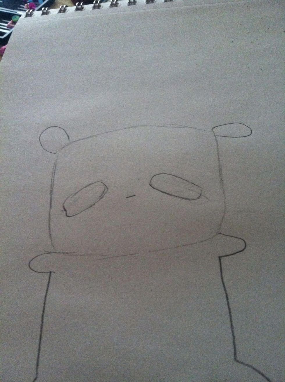 Add ears and eyes as well as a nose