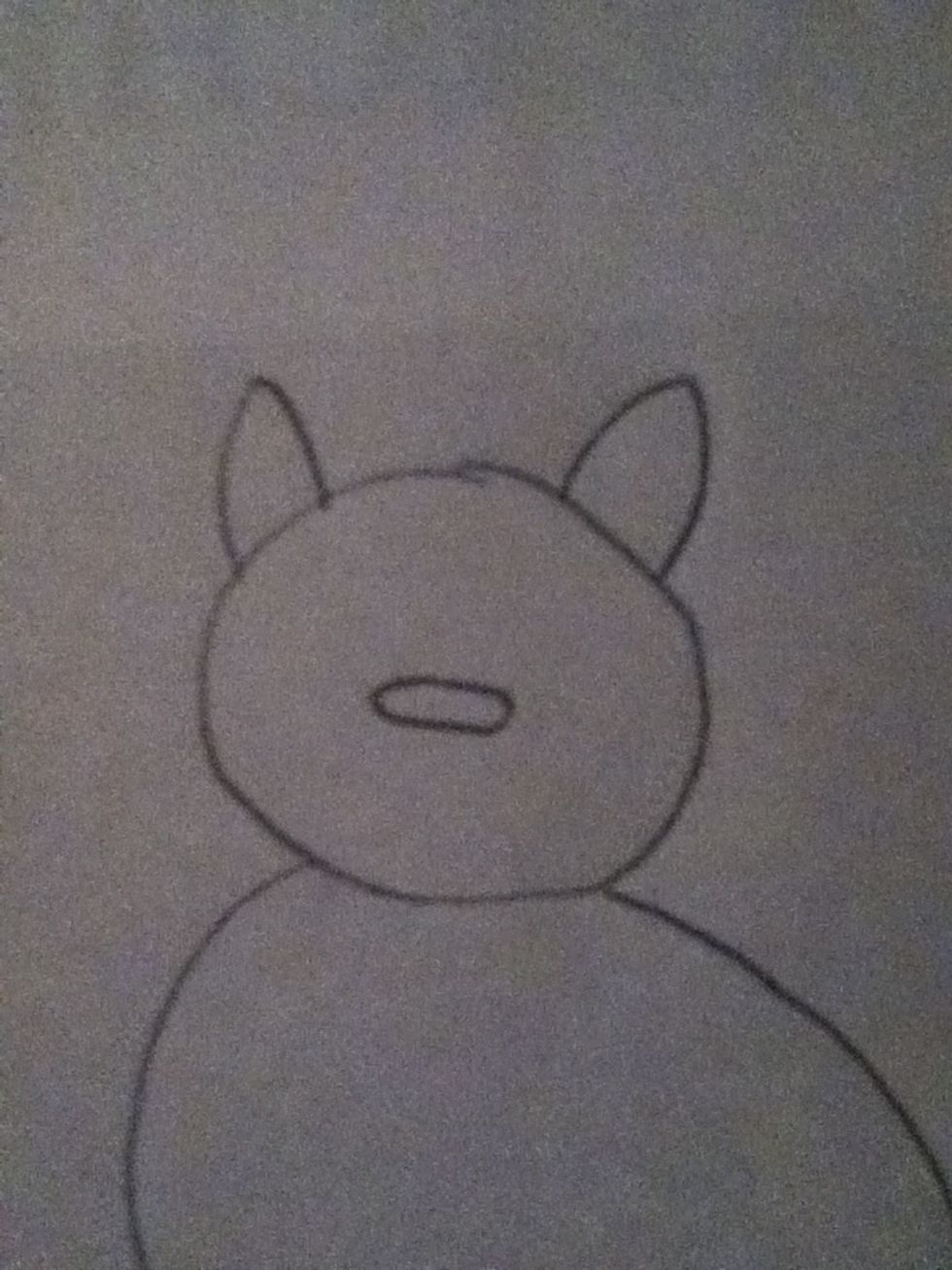 Add ears/triangles at the smaller circle also and an oval for the nose.