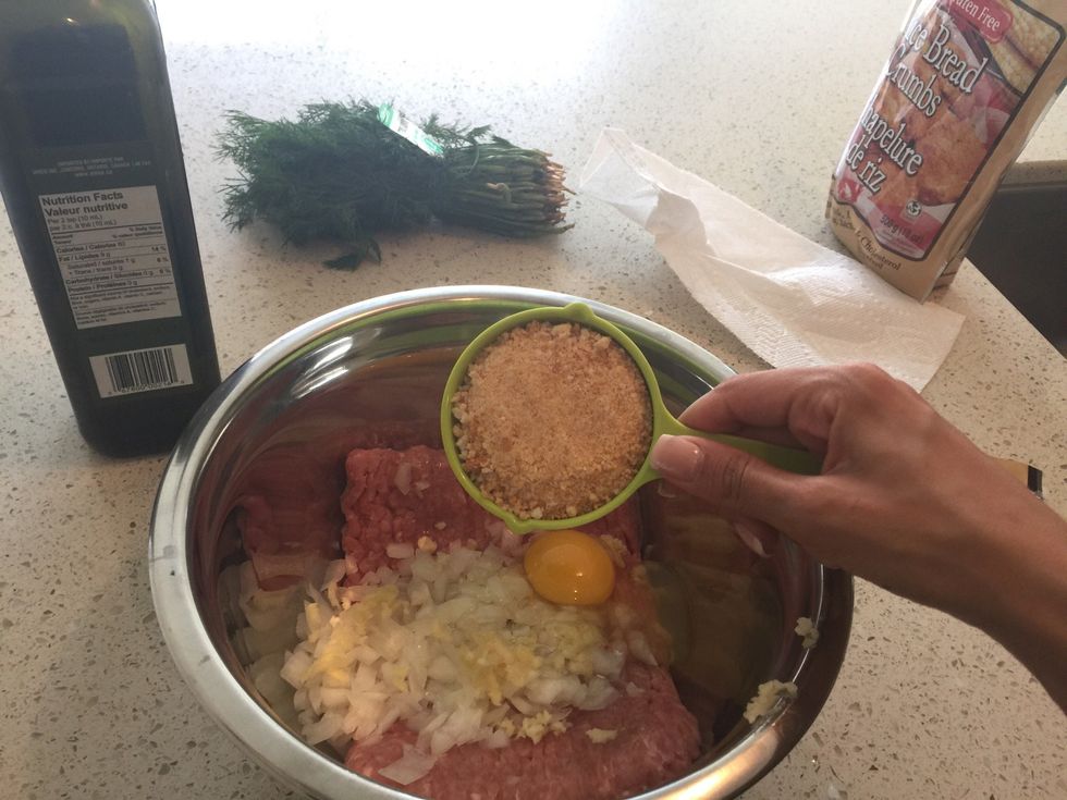 Add egg and gluten free bread crumbs