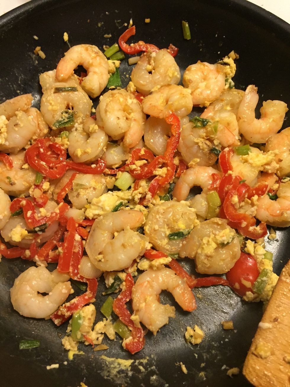 Add egg. Quickly break it & stir in with everything in the pan until egg is cooked.