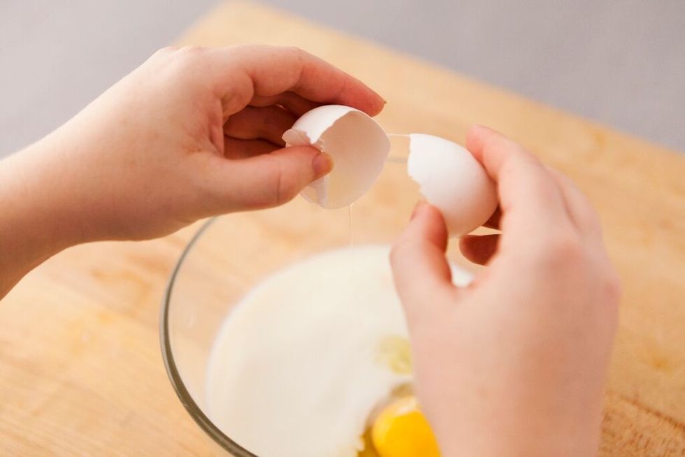 Add egg to mixture and whisk.