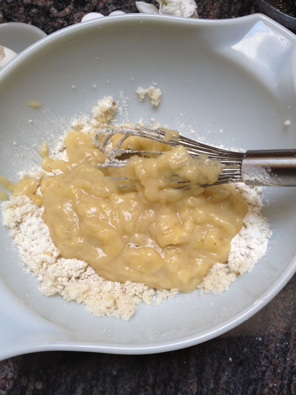 Add egg, vanilla extract, and banana mash then mix