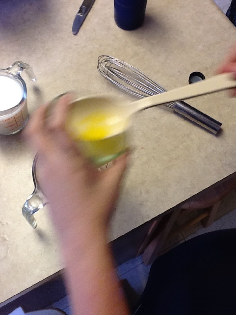 Add egg yolks to 1/2 cup hot broth.