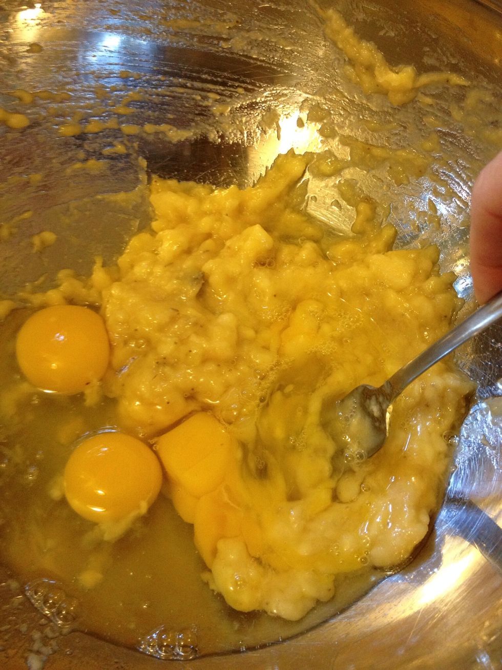 Add eggs and beat in with mashed bananas.