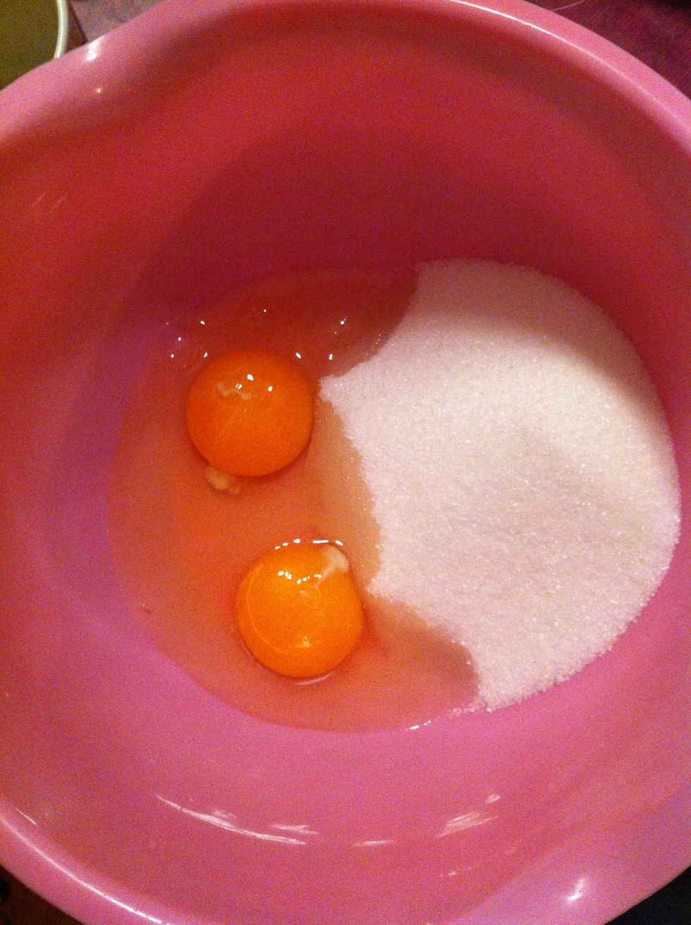 Add eggs and sugar to bowl