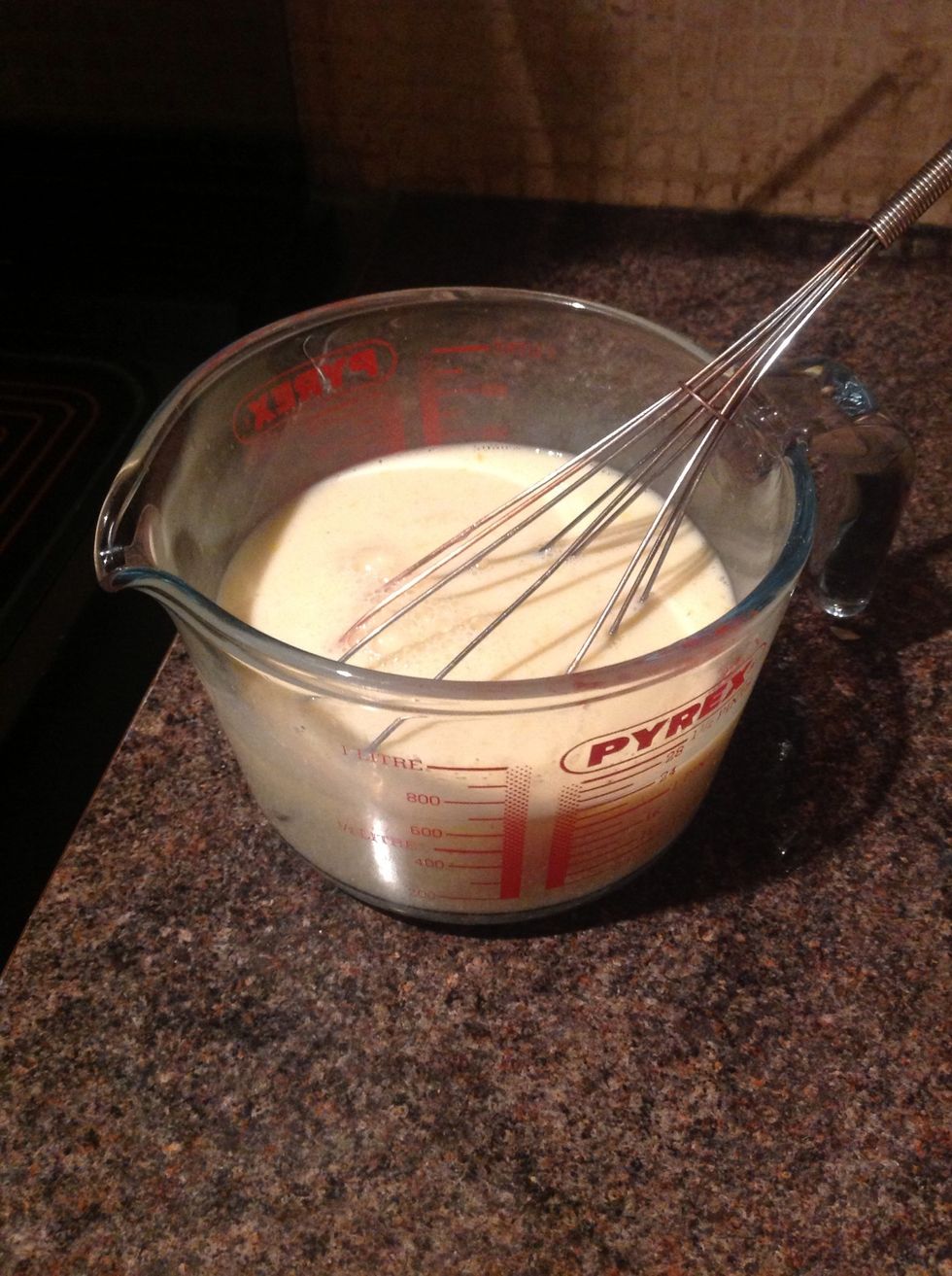 Add eggs to the milk, season and whisk
