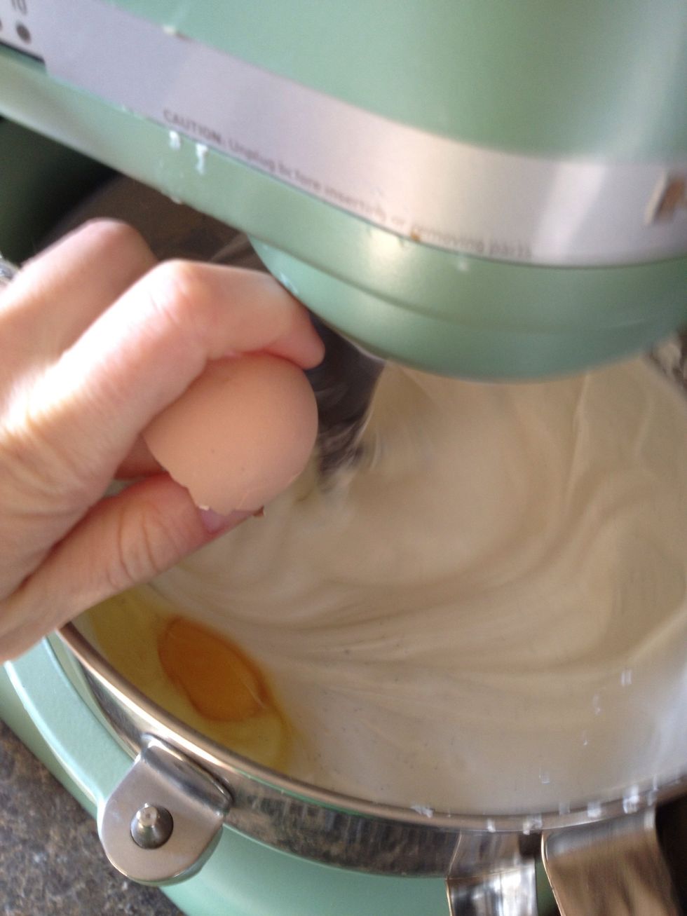 Add eggs, which should also be room temperature, one at a time, mixing on low just until they're incorporated.