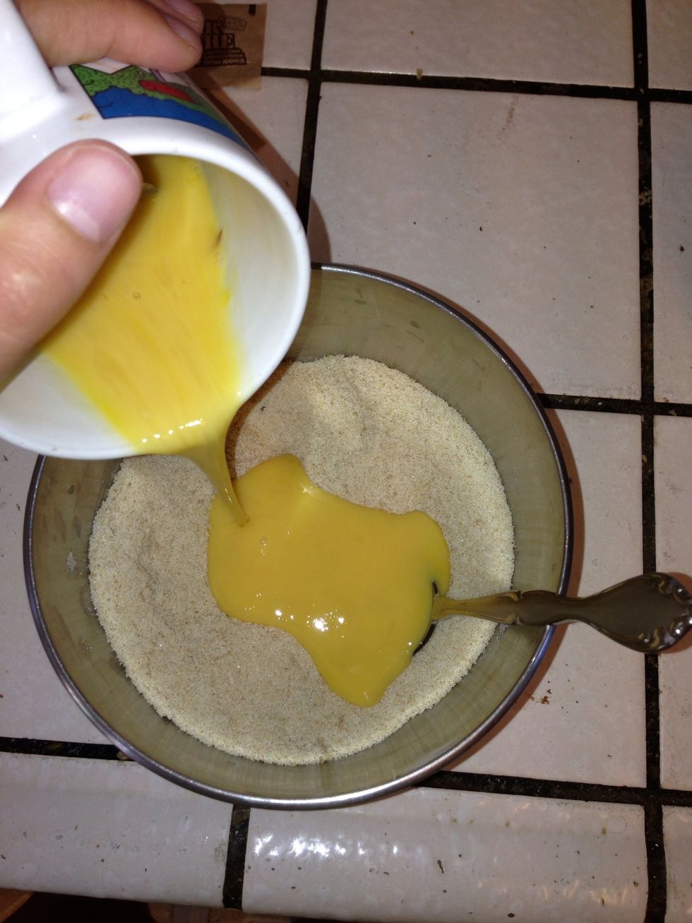 Add eggs with the sugar notice that the sugars are already mixed together