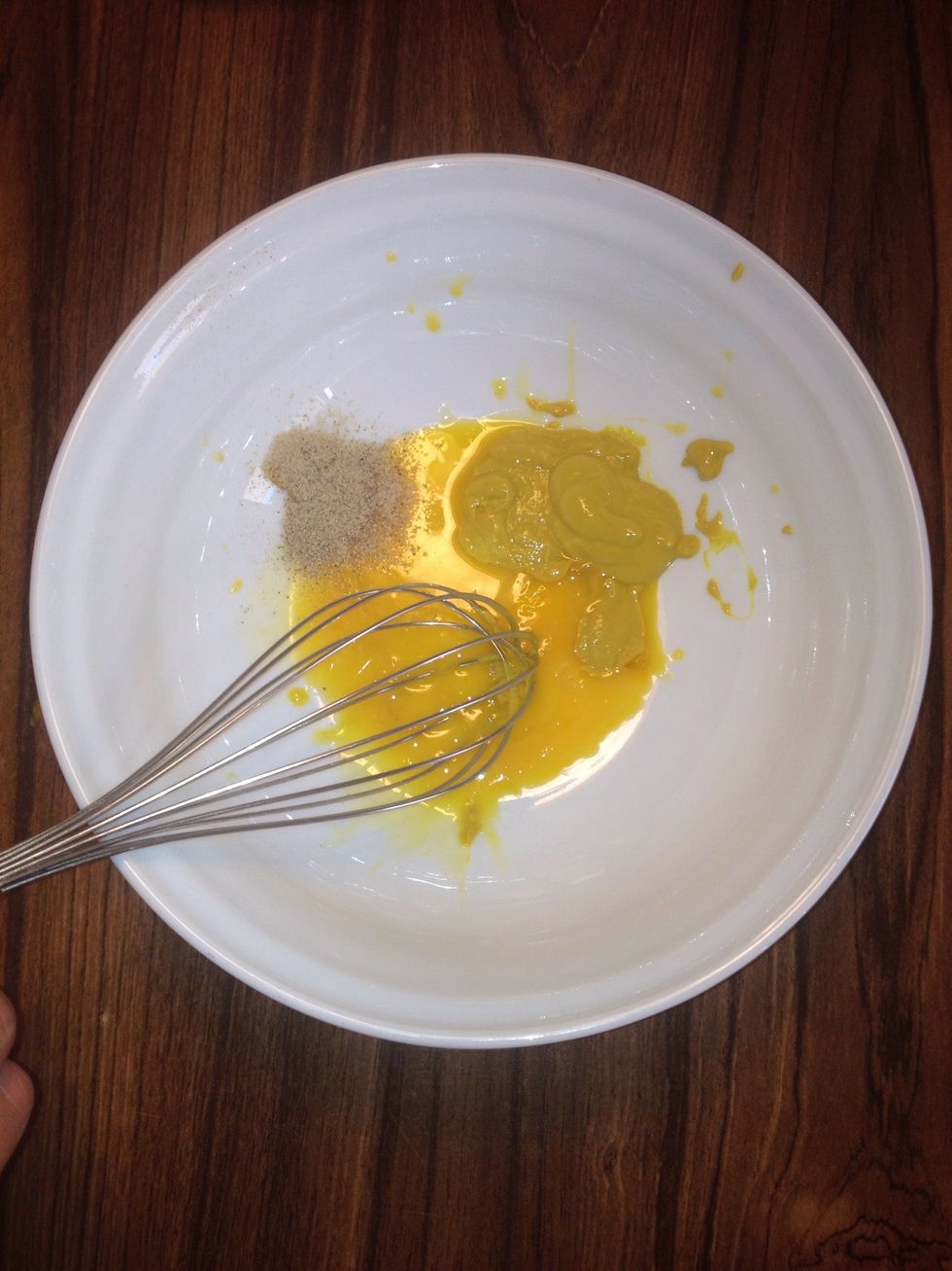 Add eggs yolk , mustard , and white pepper together